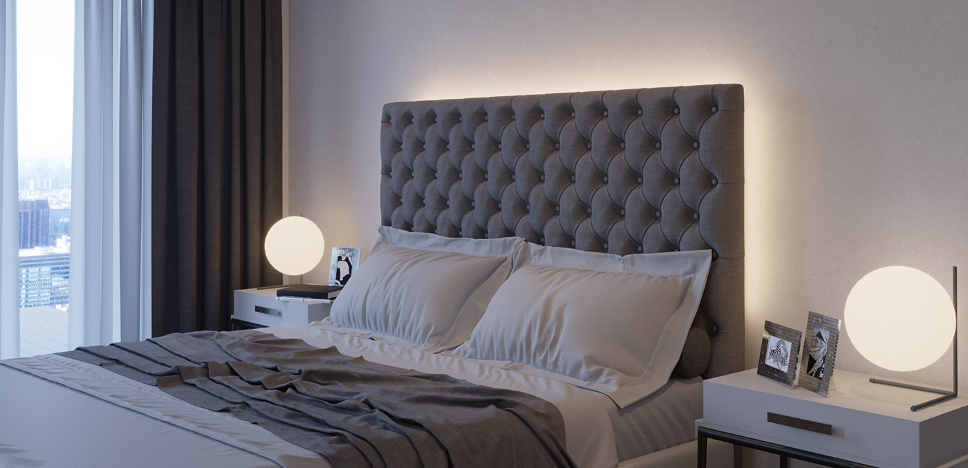 Chambre d'hôtel : L'éclairage indirect du lit met en valeur la tête de lit.